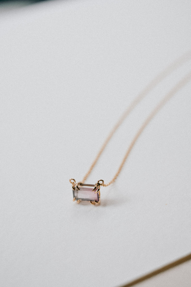 Recycled gemstone on handcrafted asymmetrical setting