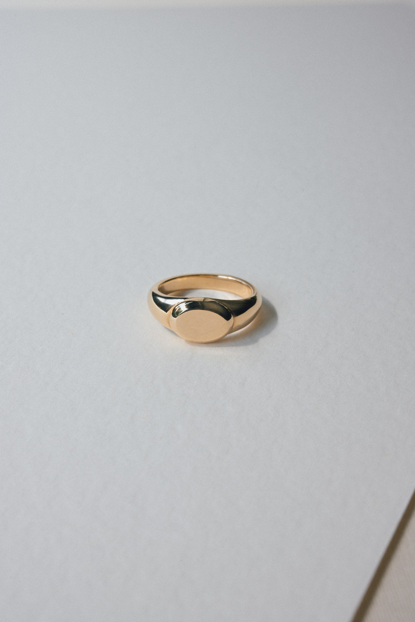 Signature signet ring on a white background